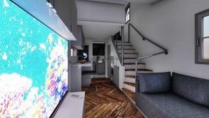 This tiny house model is less than 215 square feet, but for such a small design it has a very well-used vertical space.