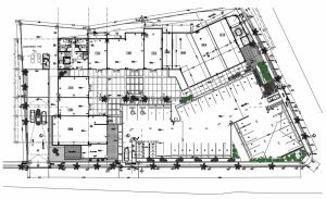 Architectural and overall floor plan of a shopping mall with division of commercial premises, parking area, maneuvering yard, restrooms, landscape area, plan for free download in AutoCAD DWG format.